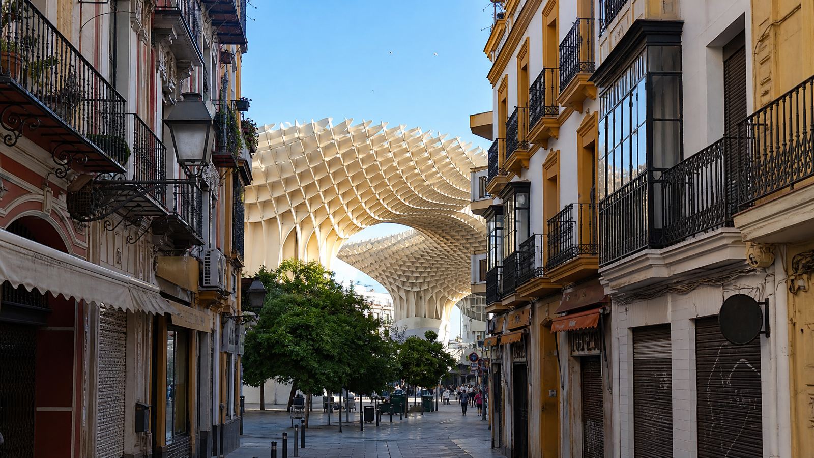Pedestrian street in central Seville with the Metropol Parasol in the distance